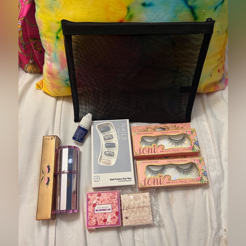 New Makeup Bundle of 9 Contains Lashes, Nails, Blush, Mascara highlighters & Bag